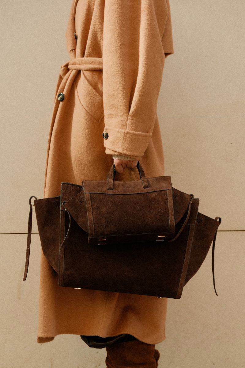 Saonara chocolate suede shoulder shopping bag with sleek design and sturdy handles, perfect for everyday use.