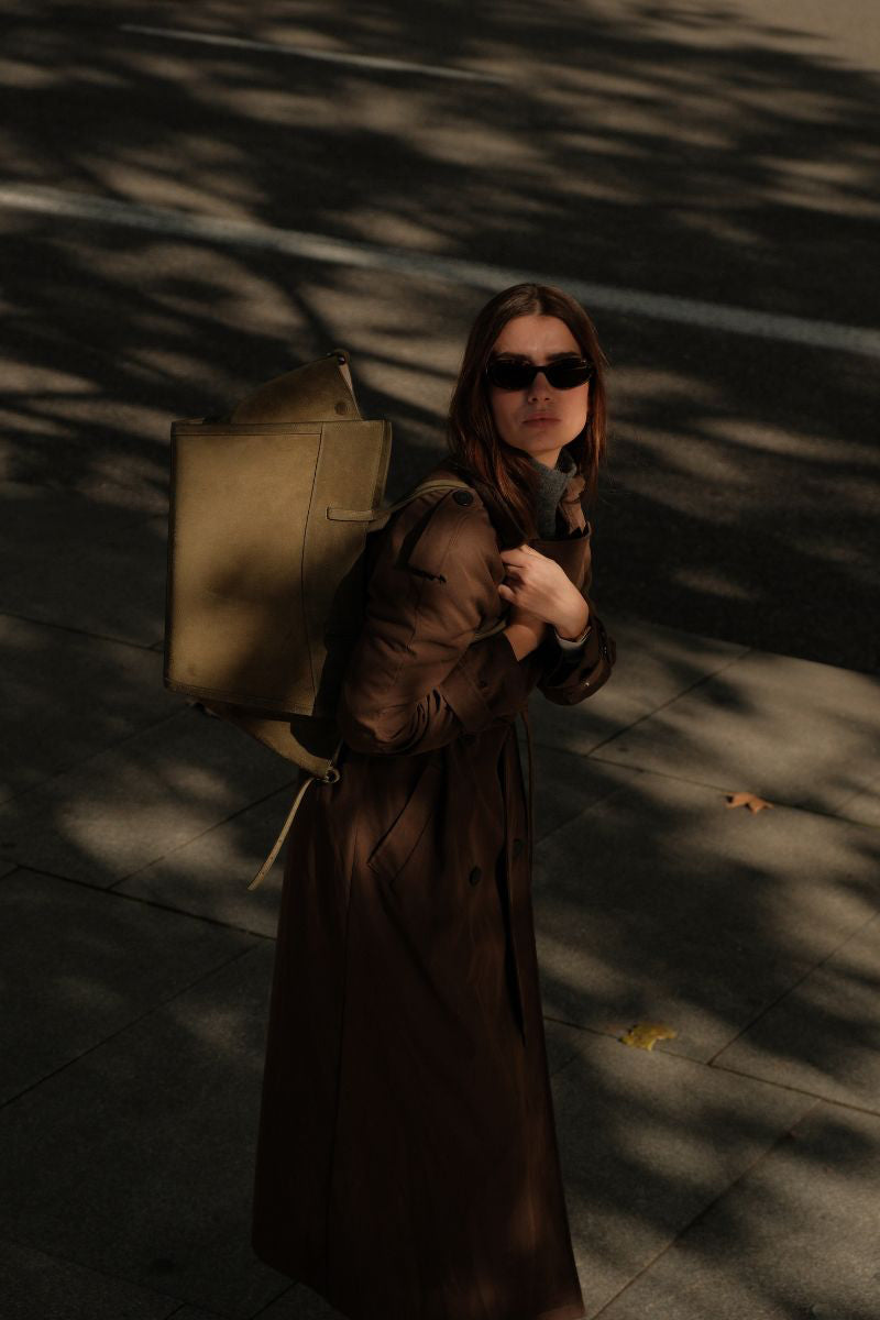 Olive green suede shoulder shopping bag by Saonara with a sleek, minimalist design and sturdy shoulder strap.