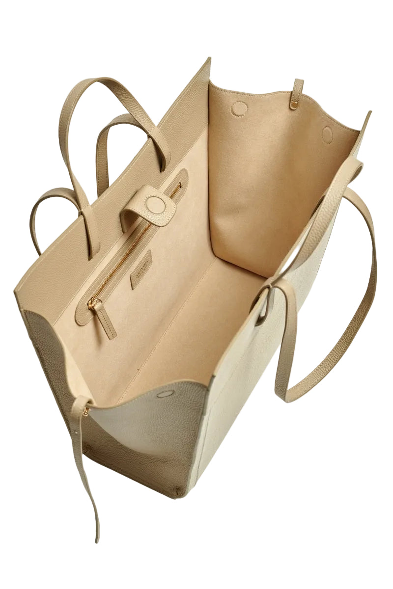 Taupe leather shoulder shopping bag by Saonara with sleek design and sturdy handles, perfect for everyday use.