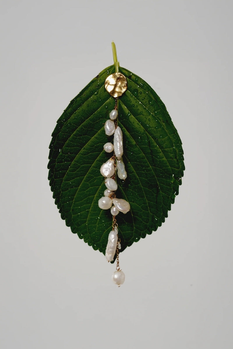 Elegant LAVANI JEWELS Siena Pearl Earrings featuring lustrous pearls and delicate design, perfect for sophisticated style.