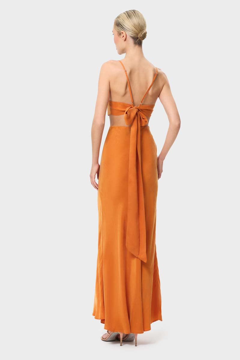 Back view of niLuu Sienna Lucy slip maxi skirt with a flowing fabric and subtle slit detail.