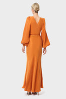 NiLuu Sienna Maia wrap top in soft fabric, shown from the back with a stylish drape and fitted design.
