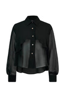Black Sienna blouse by Lorena Saravia, stylish women's top with elegant design, shown on a model.