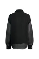 Black Sienna blouse by Lorena Saravia, stylish women's tops featuring a relaxed fit and elegant design.