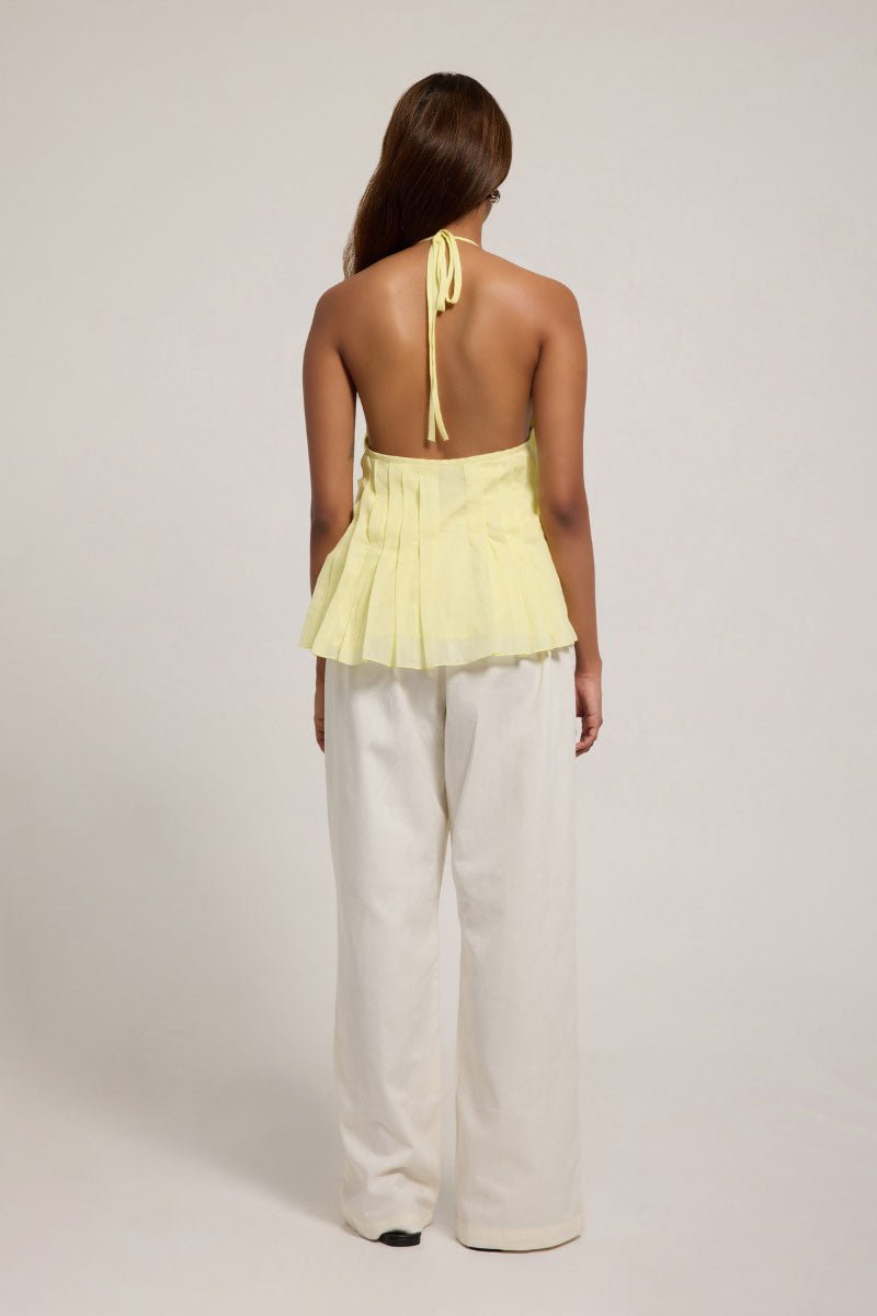 Yellow Sierra top from Summer Away in canary color, featuring a stylish sleeveless design and lightweight fabric.