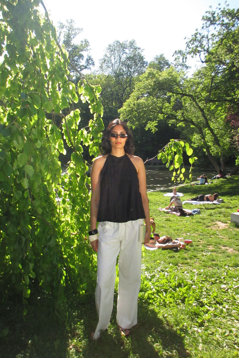 Black Sierra Top by Summer Away featuring a stylish, fitted design and short sleeves for casual or dressy occasions.