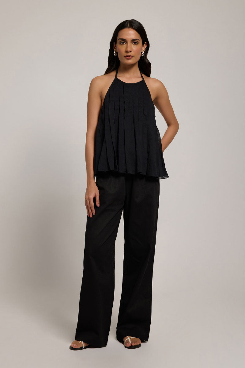 Black Sierra Top by Summer Away, showing a stylish sleeveless blouse with a relaxed fit and modern design.