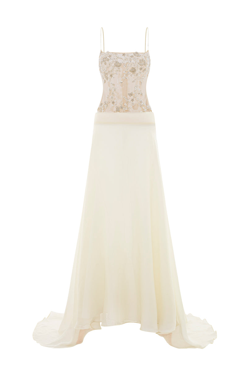 Pastel yellow POEM Sieste maxi dress with flowing fabric and elegant design, perfect for summer or casual occasions.