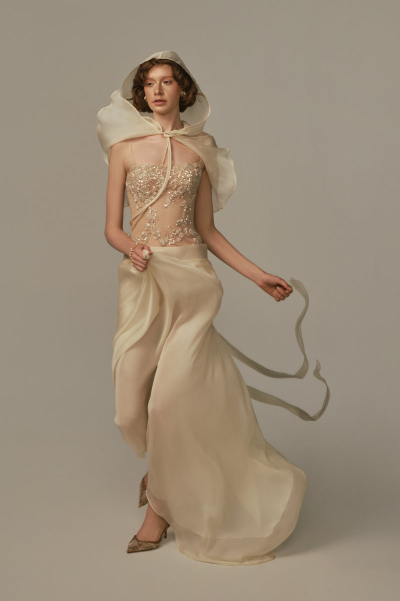 Poem Sieste Maxi Dress in pastel yellow, flowing maxi dress with lightweight fabric, worn by model in a relaxed outdoor setting.