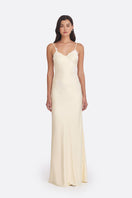Light yellow Signature V-neck maxi dress by Stolen Stores, featuring a flowing silhouette and elegant design.