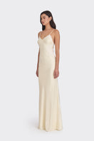 Light yellow V-neck maxi dress by Stolen Stores featuring a flowing silhouette and elegant design.