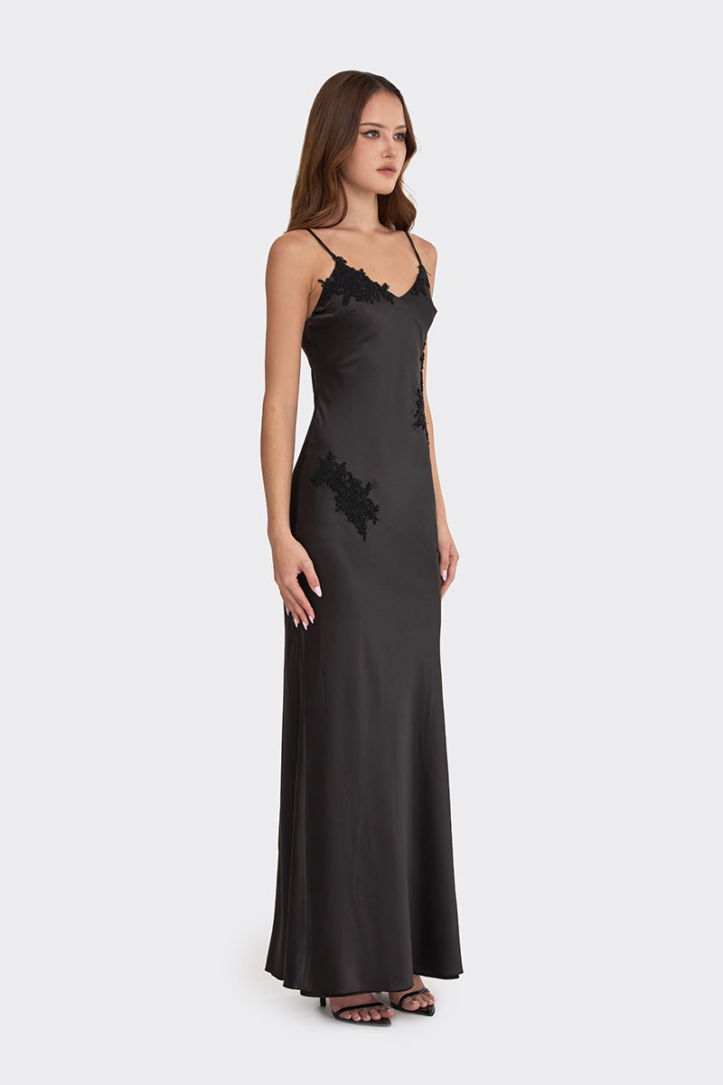 Black Stolen Stores Signature V-Neck Maxi Dress with lace detail, flowing sleeveless design perfect for elegant occasions.