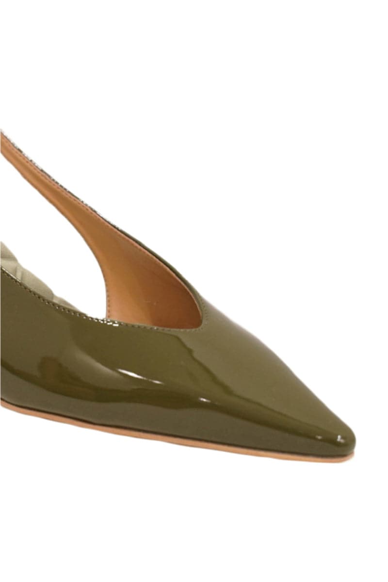 A pair of AERA Silvana green patent-effect slingback pumps with pointed toes, displayed from the front view.