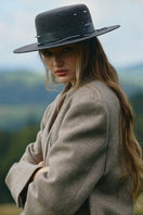 Silver gray canotier hat by LE SH KA, featuring a stylish wide-brim design and classic straw texture.