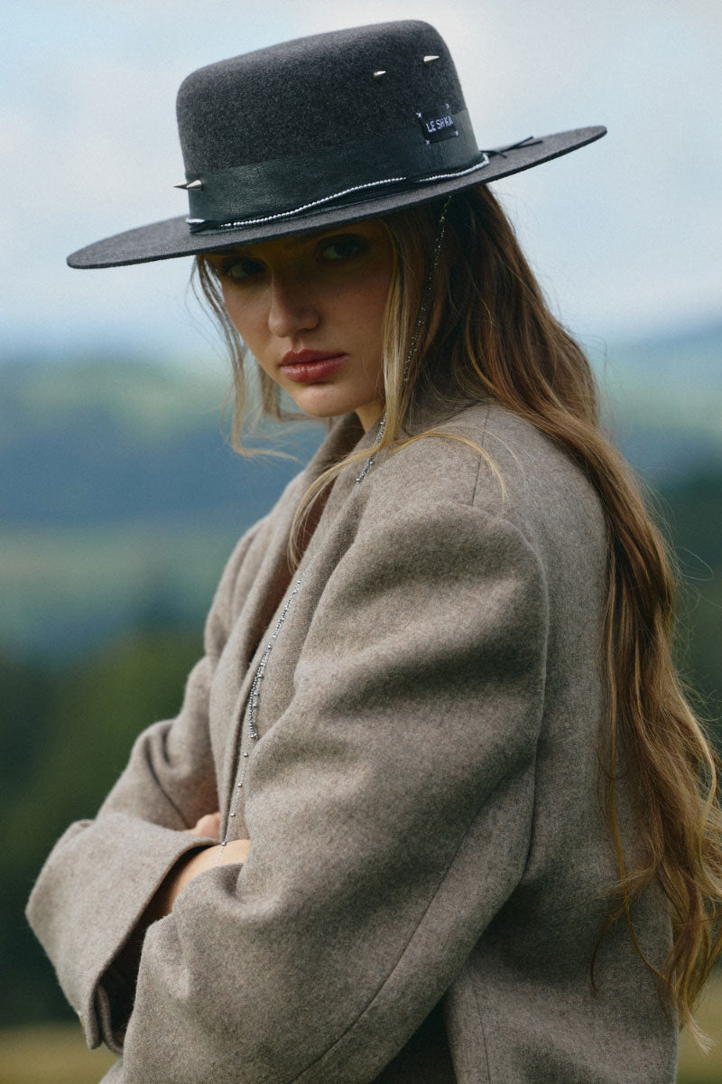 Silver gray canotier hat by LE SH KA, featuring a stylish wide-brim design and classic straw texture.
