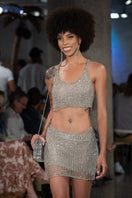 Silver Midas mini skirt with slip by Natalia Fedner, front view showing metallic silver fabric and sleek design.