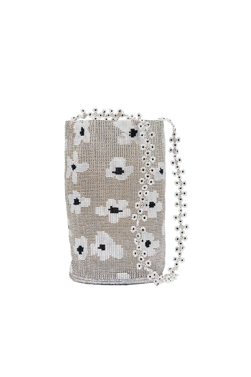 Silver Pura Utz shoulder bag with a silver flower design, featuring a sleek and stylish accessory for everyday use.