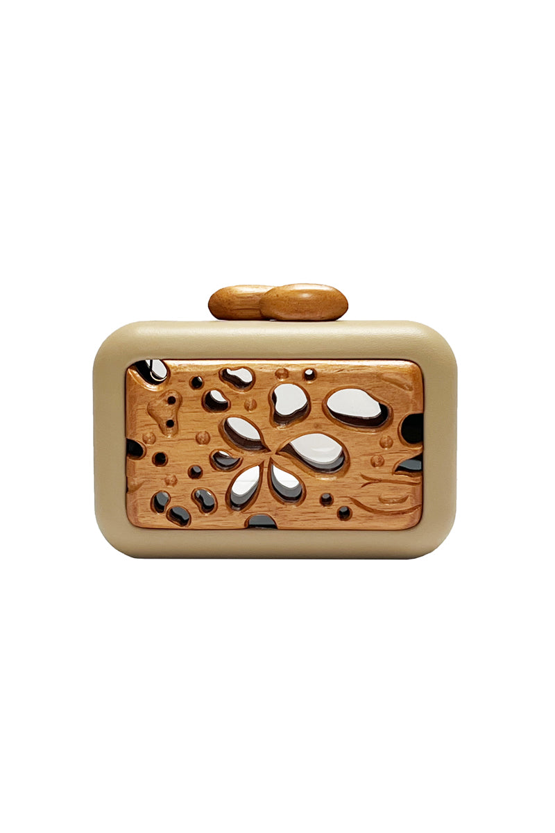 Sy&Vie beige acrylic clutch with a honeycomb design, featuring a sleek rectangular shape and textured surface.