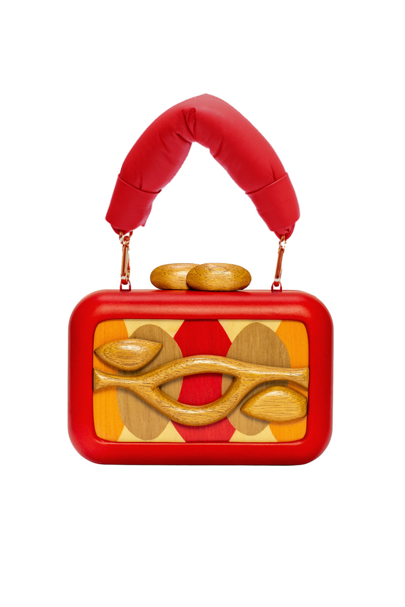 Red Sy&Vie Simétris Isometra clutch with sleek, modern design and compact size, perfect for stylish evening accessories.