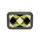 Green Sy&Vie Simetrís Polygons clutch with geometric polygon design, showcasing a stylish and modern accessory for evening use.