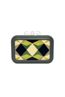 Green Sy&Vie Simetrís Polygons clutch with geometric polygon design, showcasing a stylish and modern accessory for evening use.