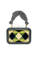 Green Sy&Vie Simetrís Polygons clutch with geometric polygon design, featuring a sleek, modern style and compact size.