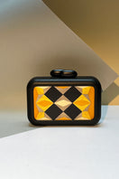 Yellow geometric clutch bag by Sy&Vie featuring polygon designs, perfect for stylish accessories or evening outings.