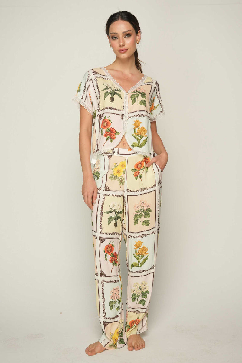 Ellipse Lingerie ellipse continuity short sleeve and pant pajama set, featuring comfortable fabric and relaxed fit.