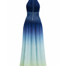 Maylé Vásquez Sirena Gown maxi dress with horizon ombre fabric, flowing design, and elegant style in the image.