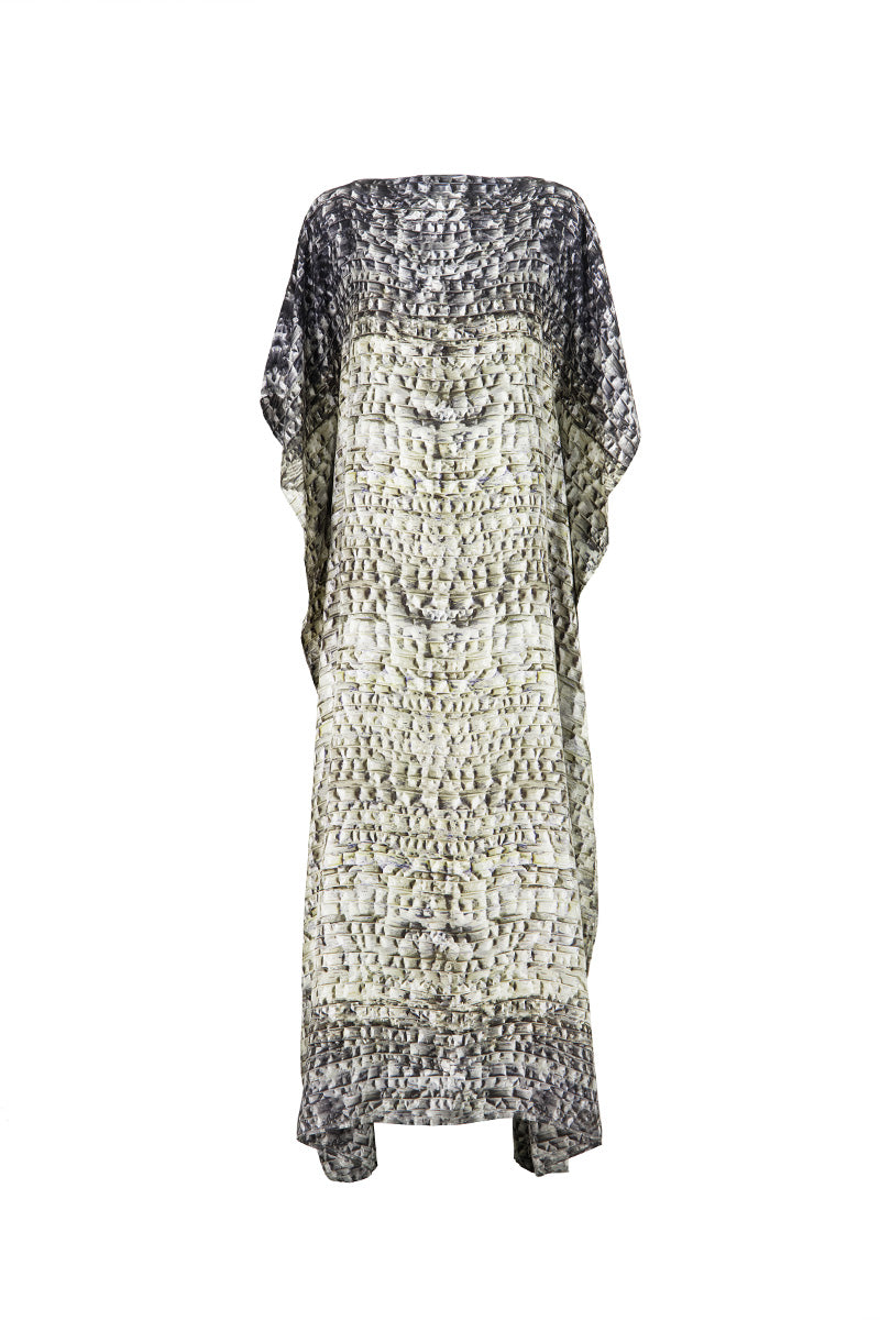 Amel Batita Skin Brocot kaftan maxi dress with flowing fabric and intricate design, displayed on a hanger.