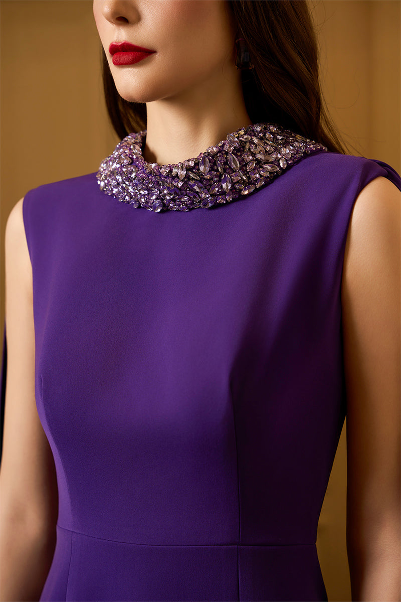 Sleeveless TIANA crepe cape gown by I.H.F featuring a mermaid silhouette and a long back train, elegant evening wear.