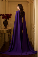 Elegant sleeveless TIANA crepe cape gown by I.H.F featuring a mermaid silhouette and a long back train.