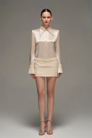 Beige satin shirt and skirt co-ords set by I.H.F Studio featuring a slim fit shirt with statement cuffs.