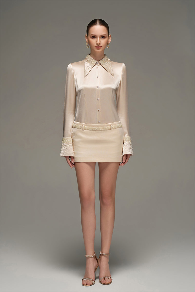 Beige satin shirt and skirt co-ords set by I.H.F Studio featuring a slim fit shirt with statement cuffs.