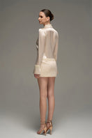 Beige satin shirt and skirt co-ords set by I.H.F Studio, slim-fit shirt with statement cuff details.