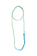 Blue Snake Totem Necklace by Pájara Pinta featuring a detailed snake design on a sleek necklace chain.