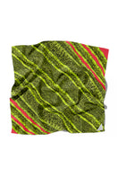 Elegant silk scarf by Amel Batita featuring the SNAQ BROCOT design, showcasing vibrant patterns and luxurious fabric.