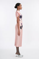 Soft pink orchid sculpted-sleeve pegged midi dress by Tiny Ink, featuring a fitted silhouette and elegant design.