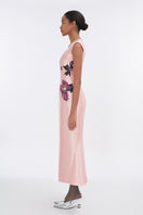 Soft pink orchid V-neck mermaid maxi dress by Tiny Ink, flowing fabric with fitted silhouette and elegant design.