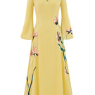 Soft yellow bishop sleeve flared midi dress by Tiny Ink, featuring a flowy silhouette and elegant design.