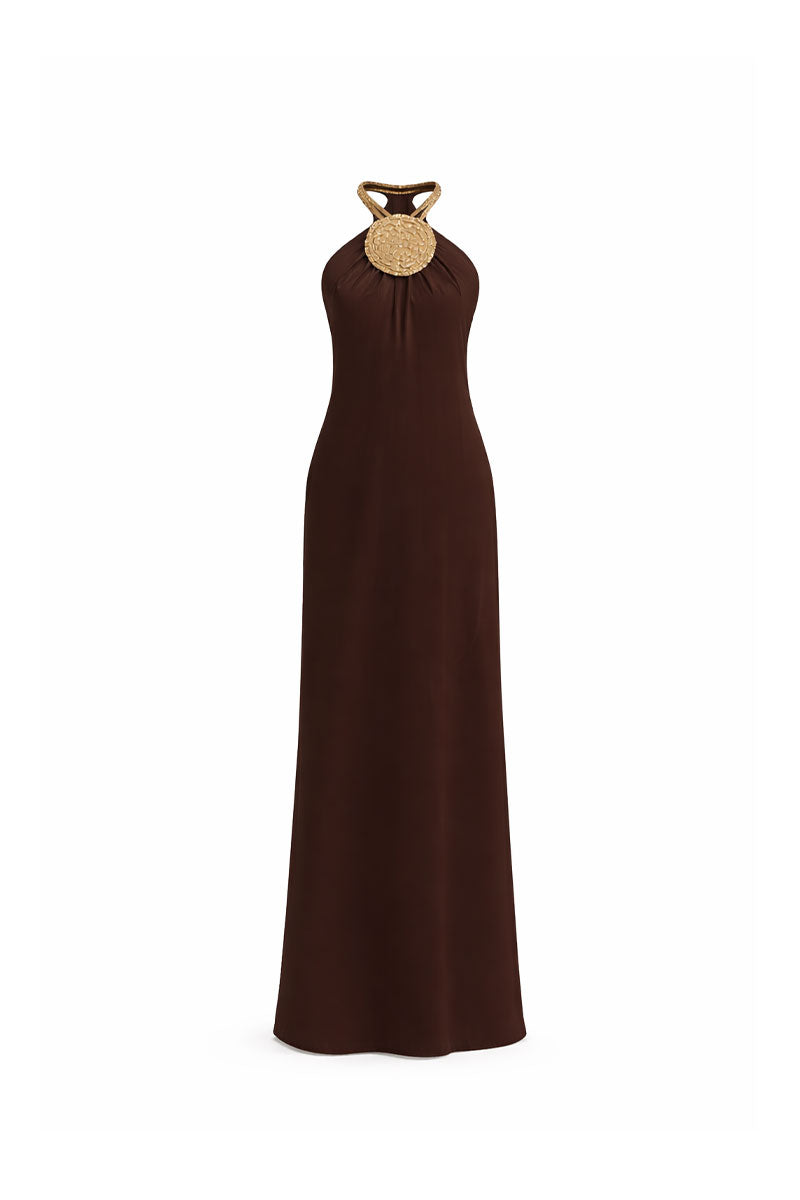 Brown Solara halterneck maxi dress by Maylé Vásquez, featuring a flowing silhouette and elegant halterneck design.