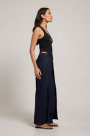 Summer Away Solaya top in vibrant color, featuring a stylish sleeveless design with a fitted silhouette and classic neckline.
