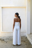 Off-white ANA + MARIA Sole Pants, stylish casual pants with a relaxed fit, shown in a natural stance.