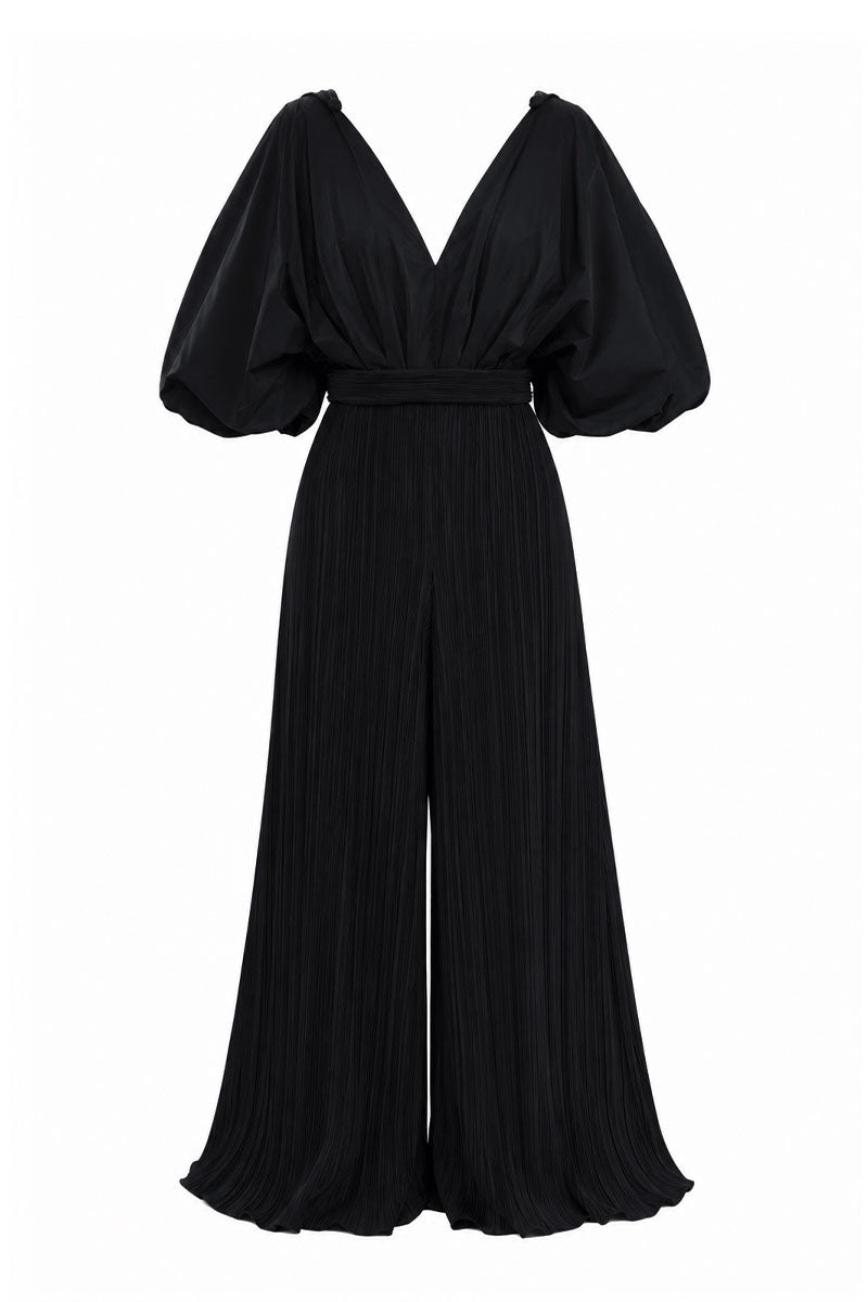 Black SOMBRA PALMA jumpsuit by Maylé Vásquez, featuring a stylish, fitted design with long sleeves and a wide-leg silhouette.