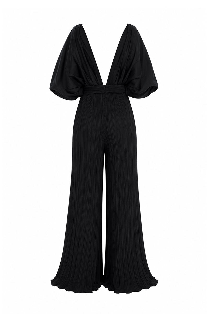 Black Sombra Palma jumpsuit by Maylé Vásquez, featuring a stylish design and comfortable fit, displayed on a mannequin.