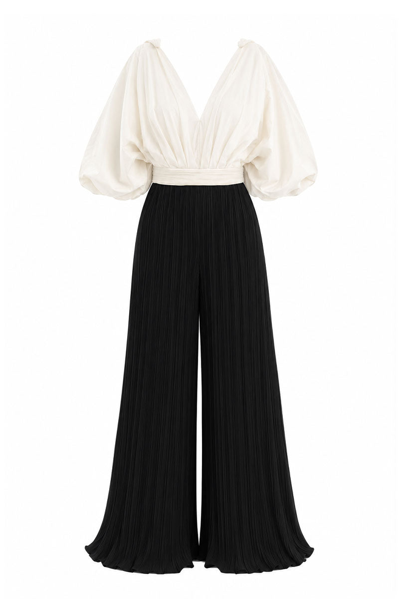 Black and white image of Maylé Vásquez Sombra Palma jumpsuit showcasing its stylish, fitted design and elegant silhouette.