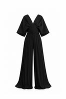 Black Sombra Palma jumpsuit by Maylé Vásquez, featuring a stylish, tailored design with a fitted waist and wide-leg pants.