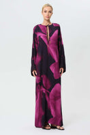 Elegant navy blue Sophia Noor kaftan maxi dress by niLuu featuring flowing fabric and intricate detailing, perfect for summer wear.