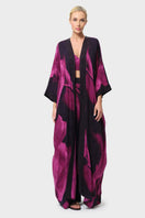 NiLuu Sophia kaftan robe with flowing fabric and intricate patterns, perfect for elegant loungewear or beachwear.