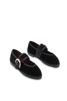 Flabelus Sophie black flats with black piping and buckle closure, showcasing the stylish slip-on footwear.